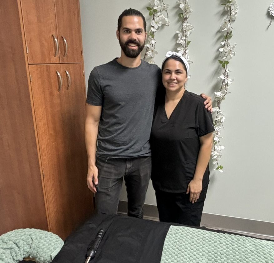 Spamarketing.com co-founder with a massage clinic owner in her treatment room